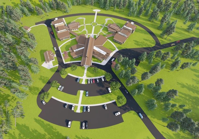 A digitally created mock up of the facility and grounds as it would look from the air including parking lot, sidewalks, buildings, and outdoor features